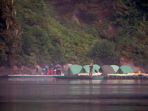 Floating docks with tent city and guests