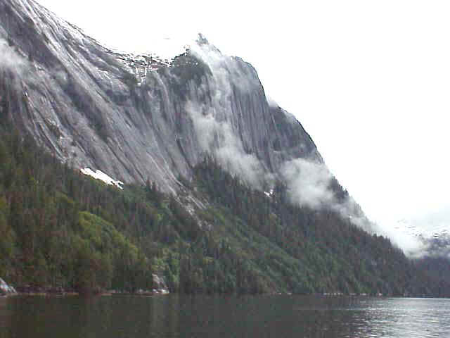 Cliff walls rise from Punchbowl Bay